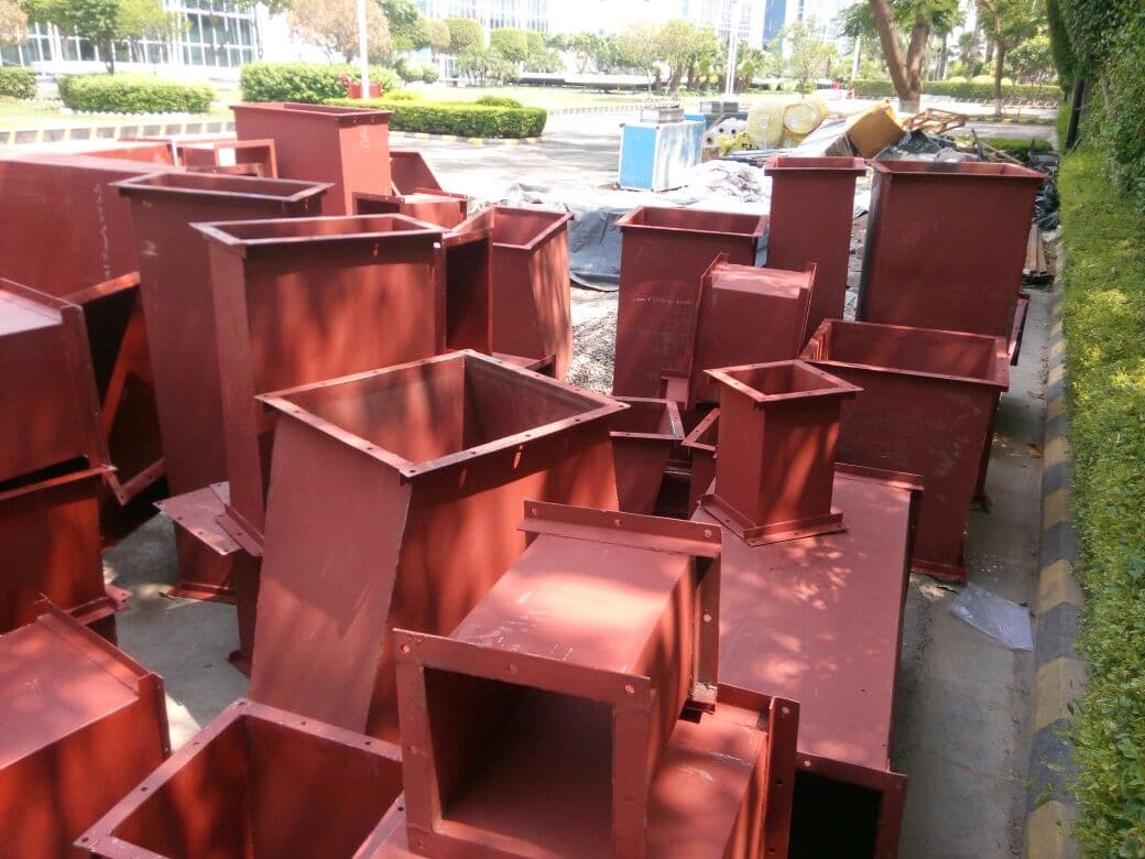 Red-oxide primed MS duct fittings and transitions in the fabrication yard