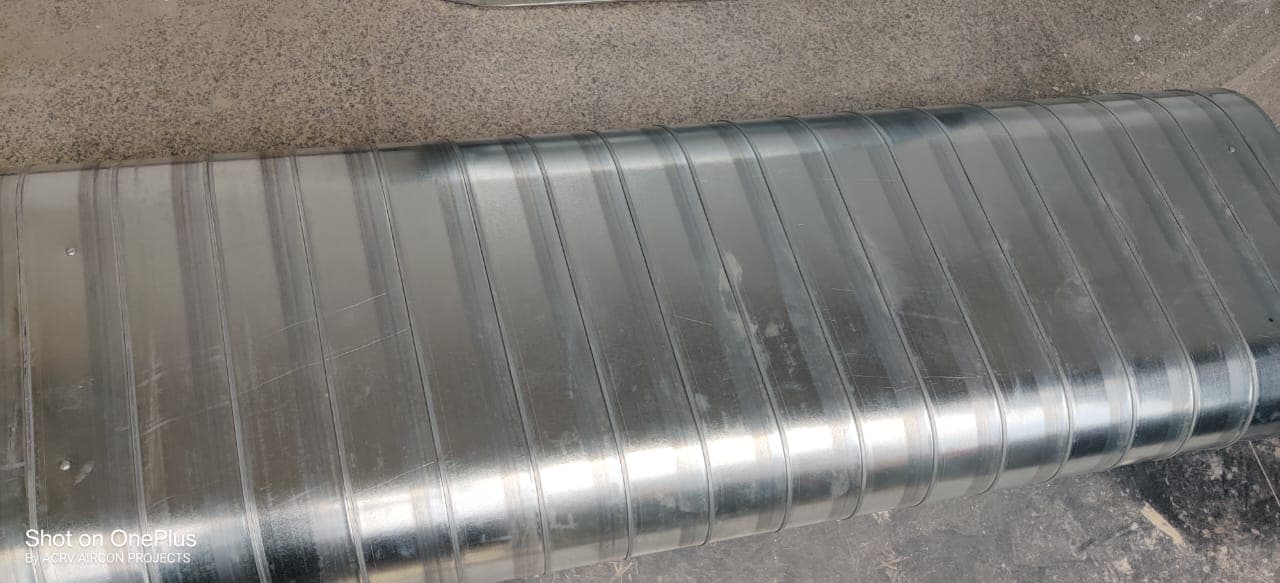 Close-up of a spiral-wound round GI duct section by ACRV Aircon