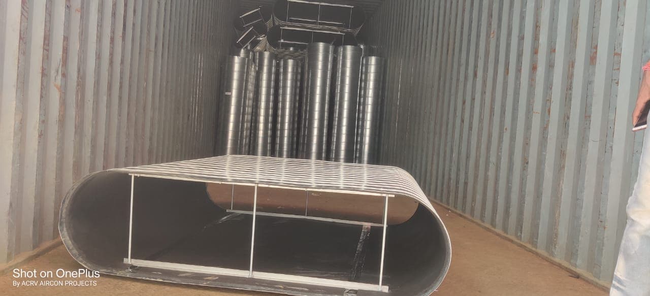 Spiral and flat-oval GI ducting bundled inside a shipping container